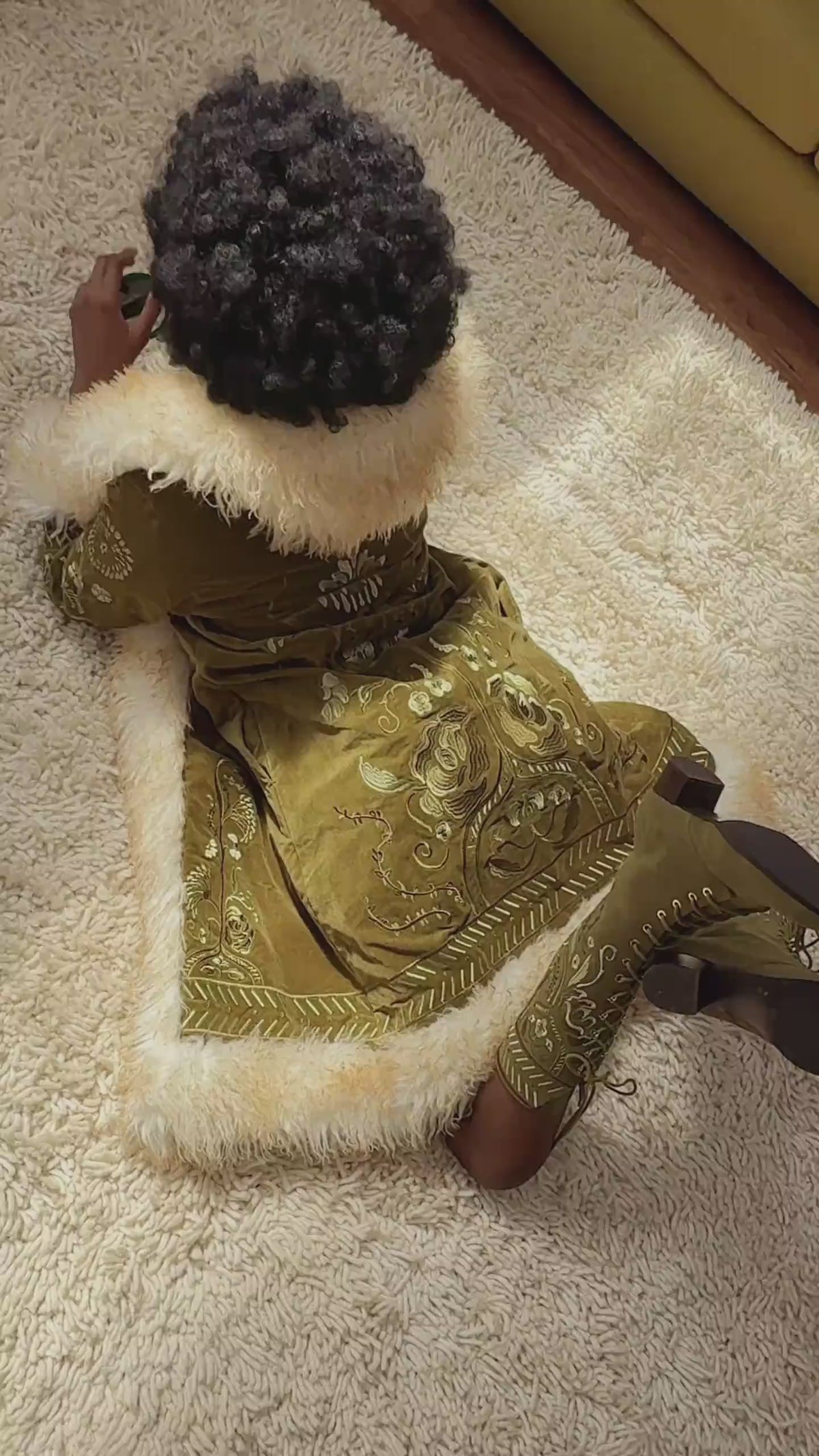 UGC of model wearing The Hippie Shake's Juniper Green Embroidered Long Penny Lane Coat