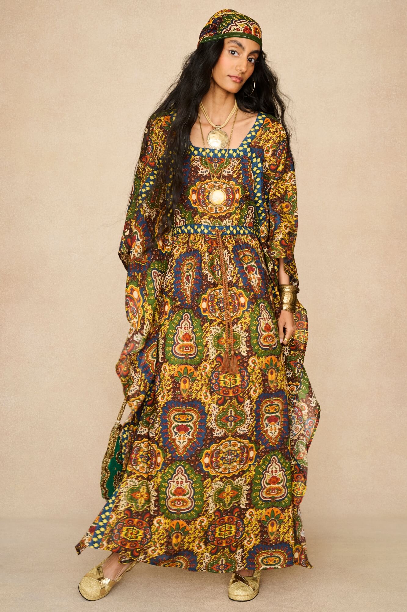 Model wearing 70s printed kaftan by The Hippie Shake, front view