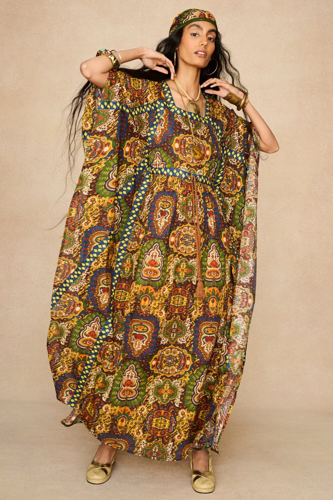 Model wearing 70s printed kaftan by The Hippie Shake, front view