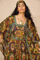 Model wearing 70s printed kaftan by The Hippie Shake, close up