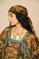 Model wearing 70s printed kaftan by The Hippie Shake, details