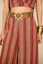 Model wearing striped pants inspired by 70s style with matching striped vest for co-ord outfit, by The Hippie Shake, close up