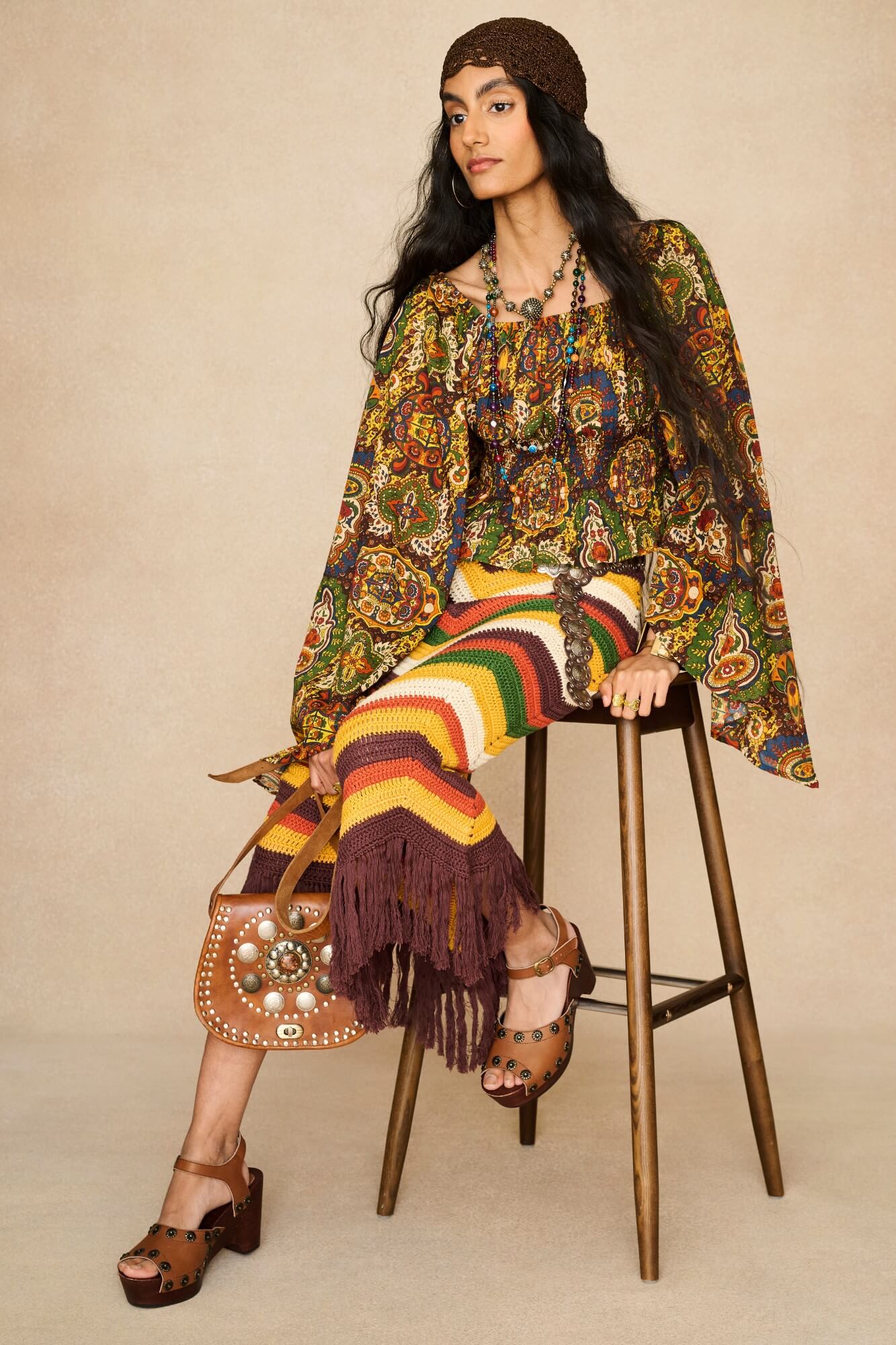 Model wearing 70s printed long sleeve top by The Hippie Shake, front view