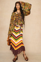 Model wearing 70s printed long sleeve top by The Hippie Shake, front view