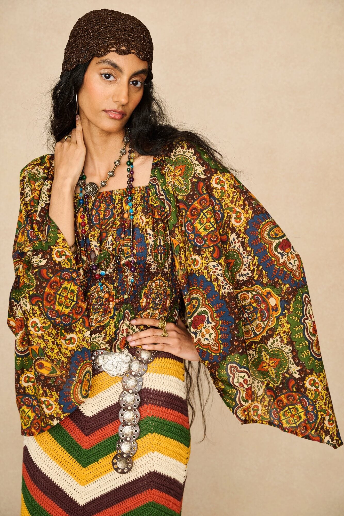 Model wearing 70s printed long sleeve top by The Hippie Shake, close up