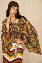 Model wearing 70s printed long sleeve top by The Hippie Shake, close up